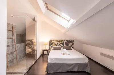 Un ou plusieurs lits dans un hébergement de l'établissement Petit Loft proche Place Darcy