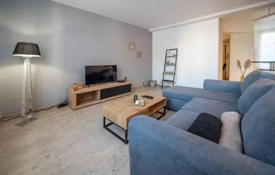Télévision ou salle de divertissement dans l'établissement Duplex - centre-ville