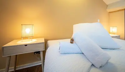 Un ou plusieurs lits dans un hébergement de l'établissement Duplex - centre-ville