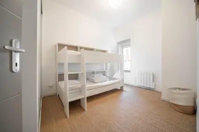 Un ou plusieurs lits dans un hébergement de l'établissement Hyper Centre Gare TER - 4 lits - 6 couchages