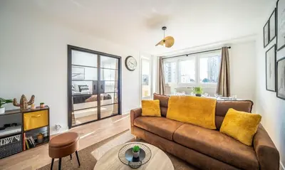 Coin salon dans l'établissement Home SWEET HOME