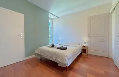 Un ou plusieurs lits dans un hébergement de l'établissement Du soleil au balcon - Hypercentre
