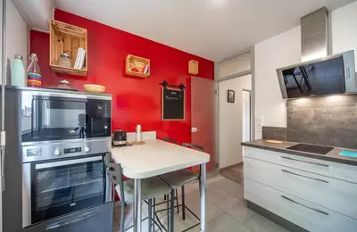 Cuisine ou kitchenette dans l'établissement Les Lauriers