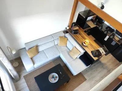 Coin salon dans l'établissement Duplex moderne, chaleureux au calme à Toison d'or