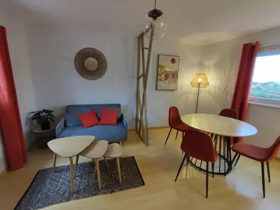 Coin salon dans l'établissement appartement 35m2