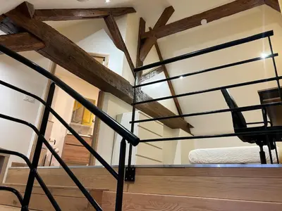 Un ou plusieurs lits superposés dans un hébergement de l'établissement Le Relais - Appartement climatisé au coeur de Dijon