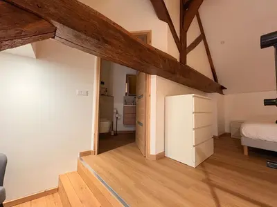 Un ou plusieurs lits dans un hébergement de l'établissement Le Relais - Appartement climatisé au coeur de Dijon