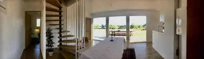 Un ou plusieurs lits dans un hébergement de l'établissement Maison bois proche de l' A6