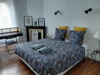 Un ou plusieurs lits dans un hébergement de l'établissement Appartement pour deux - charmant