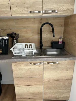 Cuisine ou kitchenette dans l'établissement Appartement F2 de 55 m2