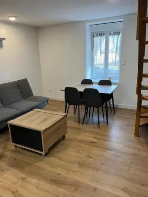 Coin salon dans l'établissement Appartement F2 de 55 m2