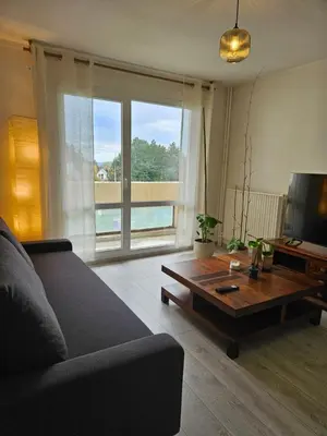 Coin salon dans l'établissement Appartement T2