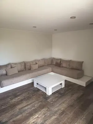 Coin salon dans l'établissement Appartement charmant à Charnay-lès-Mâcon avec jardin