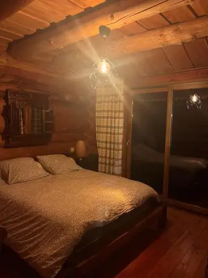 Un ou plusieurs lits dans un hébergement de l'établissement Chalet canadien en Morvan
