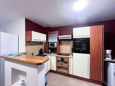 Cuisine ou kitchenette dans l'établissement le 4 - Château - Ville