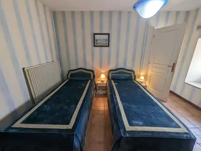 Un ou plusieurs lits dans un hébergement de l'établissement Villa antigone
