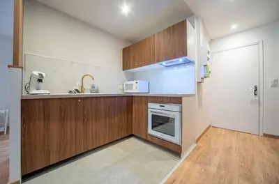 Cuisine ou kitchenette dans l'établissement Le Splendide
