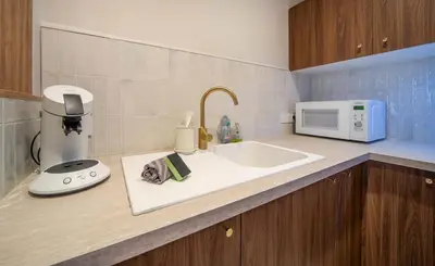 Cuisine ou kitchenette dans l'établissement Le Splendide