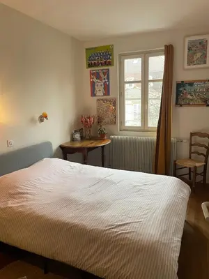 Un ou plusieurs lits dans un hébergement de l'établissement Appartement bucolique - Cœur historique Dijon