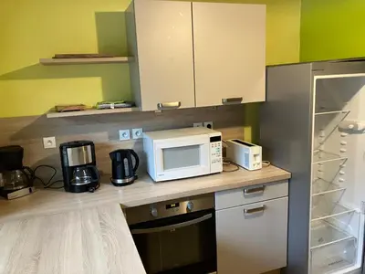 Cuisine ou kitchenette dans l'établissement Maison 14 personnes, Arbois, Gîte du Dérochoir