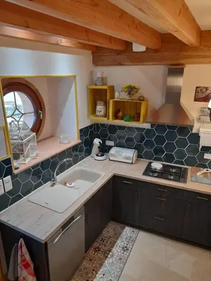 Cuisine ou kitchenette dans l'établissement La Longère des Oies