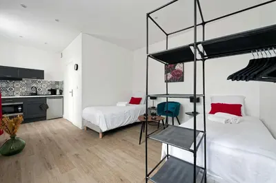 Un ou plusieurs lits dans un hébergement de l'établissement Villa Napoléon - Appart'hôtels au coeur d'Autun - Contact Hôtels