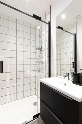 Salle de bains dans l'établissement Le Brun Moka - Résidence Mariotte