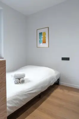 Un ou plusieurs lits dans un hébergement de l'établissement Résidence Mariotte - Le Gris Ardoise - Appartement Indépendant