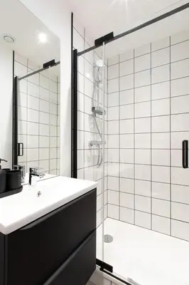 Salle de bains dans l'établissement Résidence Mariotte - Le Gris Ardoise - Appartement Indépendant
