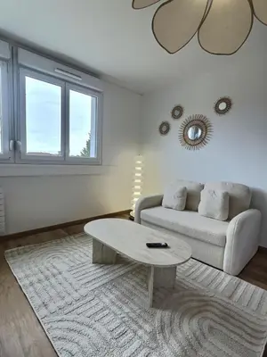 Coin salon dans l'établissement Cozy La Rocade apartment with free parking