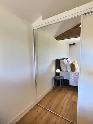 Un ou plusieurs lits dans un hébergement de l'établissement Le grenier du moulin by Miss K conciergerie