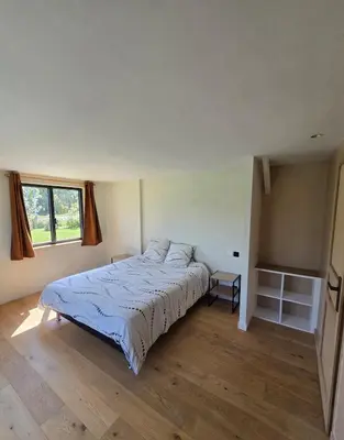 Un ou plusieurs lits dans un hébergement de l'établissement Maison à la campagne