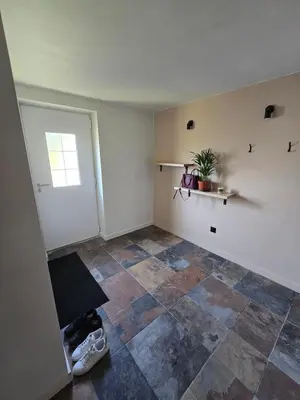 Télévision ou salle de divertissement dans l'établissement Maison à la campagne