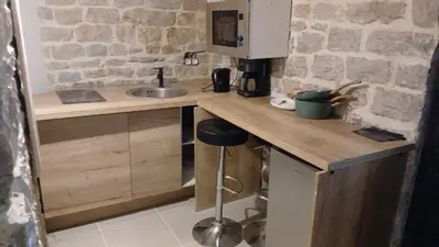 Cuisine ou kitchenette dans l'établissement Luxury suite lilas 5
