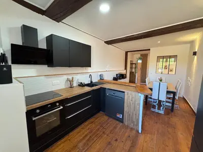 Cuisine ou kitchenette dans l'établissement L Expérience Bressane 2