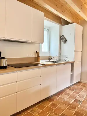 Cuisine ou kitchenette dans l'établissement La Cachette Vigneronne