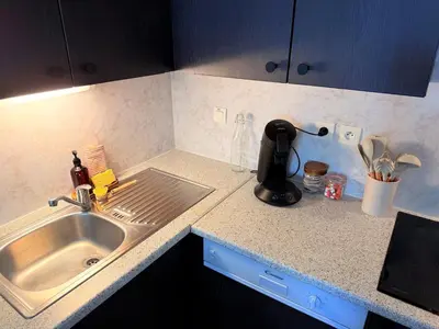 Cuisine ou kitchenette dans l'établissement Le Clos de Beaune