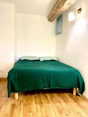 Un ou plusieurs lits dans un hébergement de l'établissement Large capacity cottage - gîte Le Pré Monon