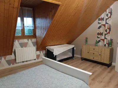 Un ou plusieurs lits dans un hébergement de l'établissement Country apartment