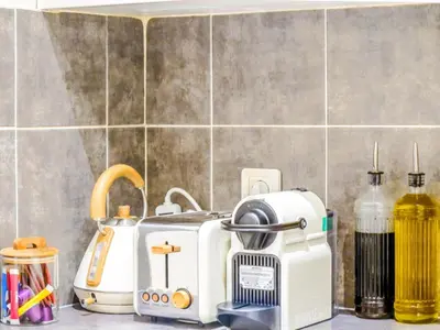 Cuisine ou kitchenette dans l'établissement Boheme Appart Cosy Centre Dijon