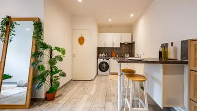 Cuisine ou kitchenette dans l'établissement Boheme Appart Cosy Centre Dijon