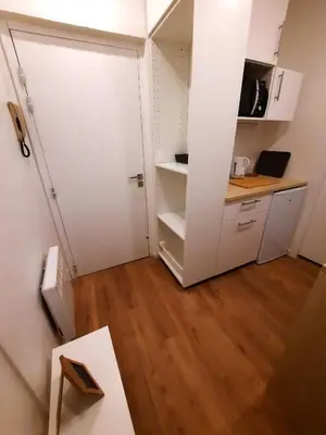 Cuisine ou kitchenette dans l'établissement La Cité - Apt 2 Personnes, Proche de la Gare