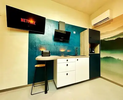 Cuisine ou kitchenette dans l'établissement L'annexe 3 - Cosy studio Dole