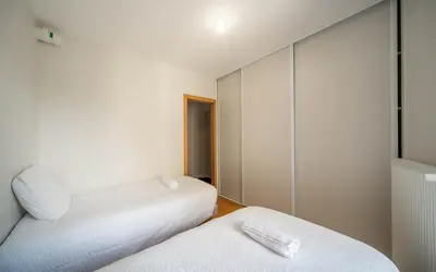 Un ou plusieurs lits dans un hébergement de l'établissement Paradis au bord de saone