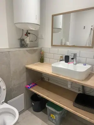 Salle de bains dans l'établissement Le Cosy