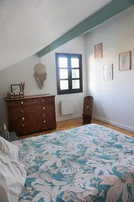 Un ou plusieurs lits dans un hébergement de l'établissement Appartement confort tout équipé