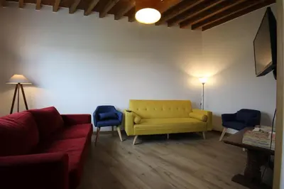 Coin salon dans l'établissement Gîte les Charmilles