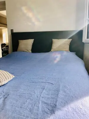 Un ou plusieurs lits dans un hébergement de l'établissement Gîte famille avec piscine en Bourgogne
