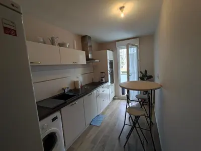 Cuisine ou kitchenette dans l'établissement T3 lumineux avec grande terrasse et parking sécurisé