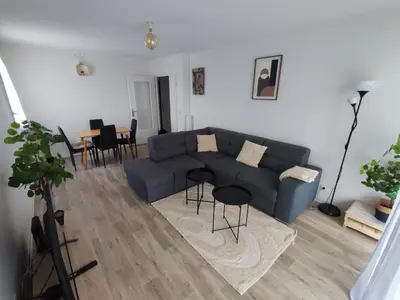 Coin salon dans l'établissement T3 lumineux avec grande terrasse et parking sécurisé